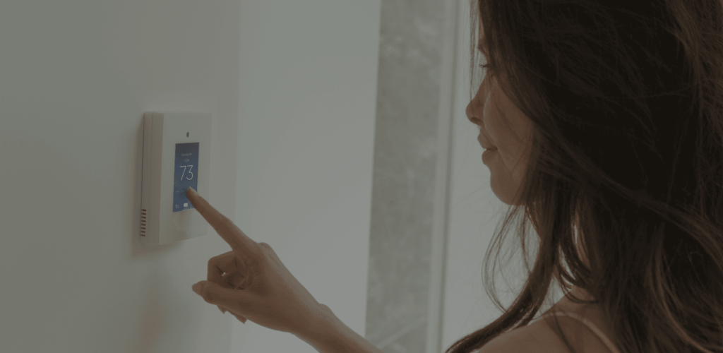 Smart home energy efficiency system with a modern thermostat optimizing climate control and power usage.
